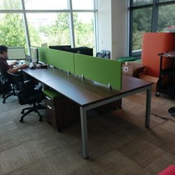 48" x 24" (Each Station Size) Benching Stations
12 Total Available
Walnut Laminate Tops, Silver Legs, Wire Management, and Green Fabric Dividers